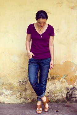 purple v-neck shirt blue jeans brown sandals by 14 shades of grey