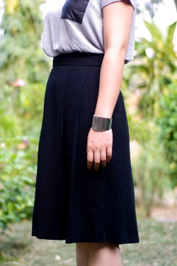 gray leather-trimmed tee black skirt silver cuff by 14 shades of grey