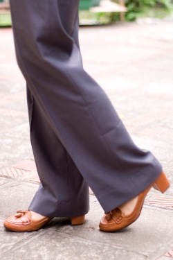 grey wide-leg pants brown heeled loafers by 14 shades of grey